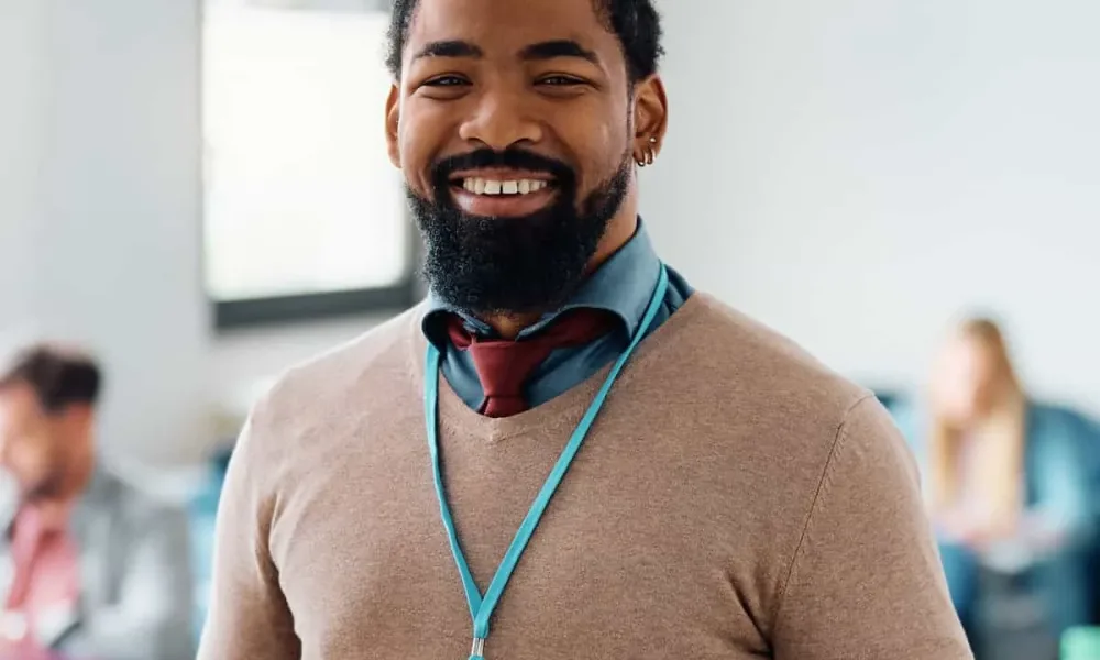 happy-black-adult-education-teacher-in-lecture-hal-2023-11-27-05-11-30-6DZHGYD.jpeg