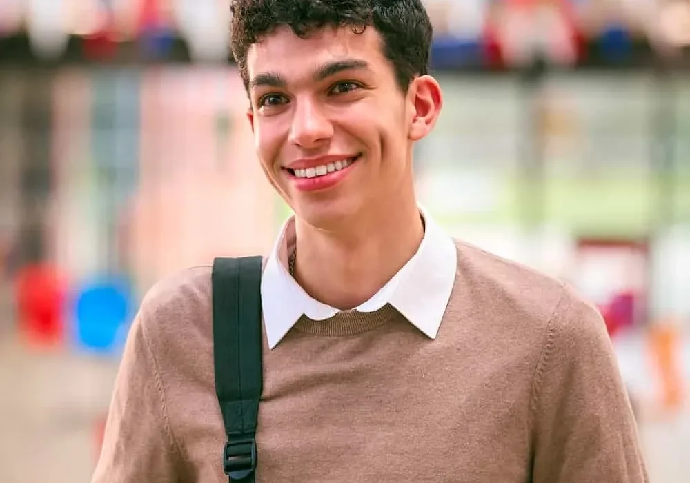 portrait-of-smiling-male-university-student-with-b-2024-02-09-14-45-35-PEQXTVB.jpg